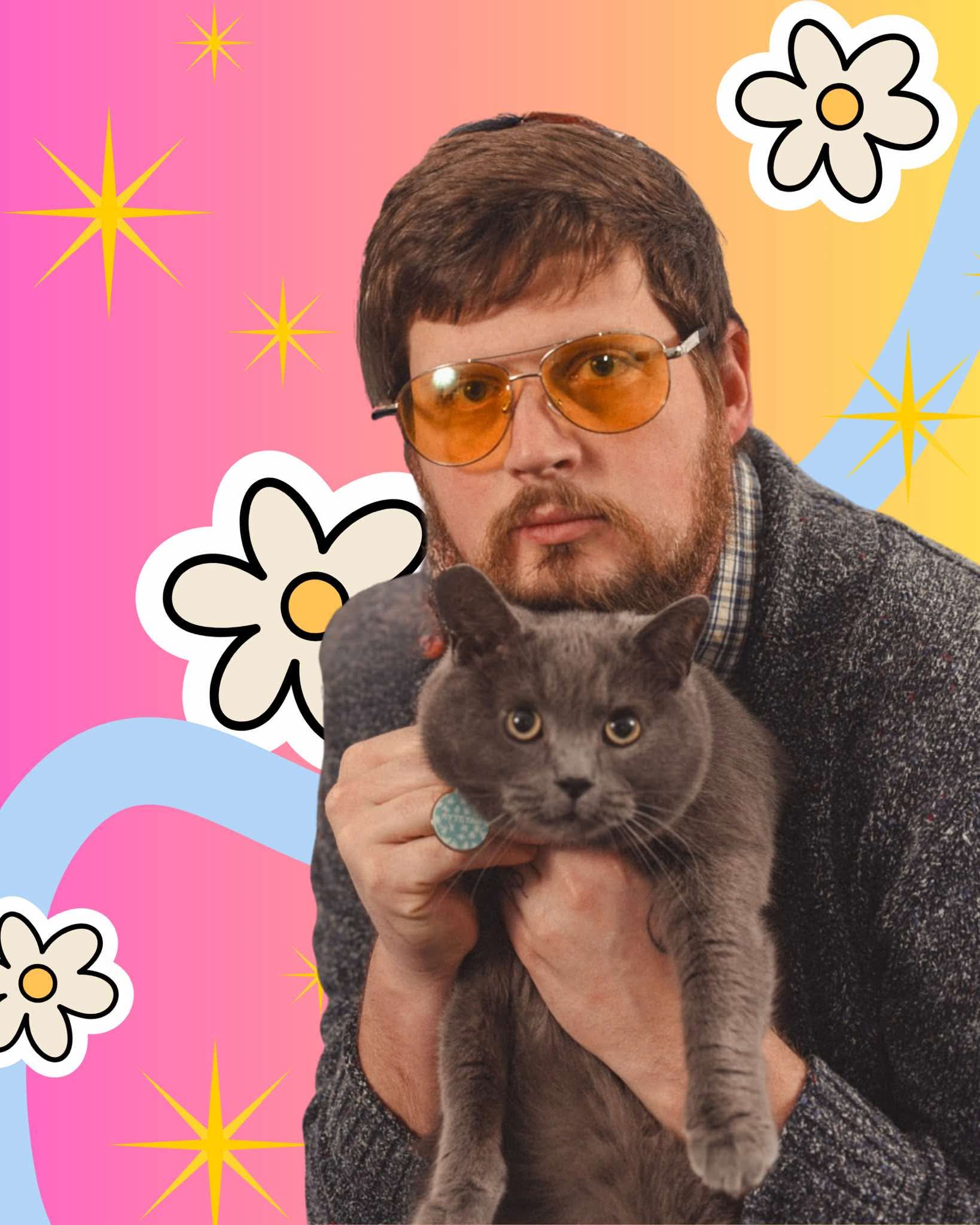 Robert Bobo holding his cat